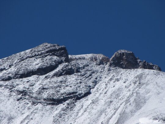 Snow-covered summit section of Ojos del Salado
